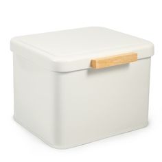 a white storage box with a wooden lid