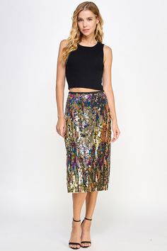 Meet the ultimate glam girl statement piece- the Charla Sparkle Midi Skirt sets the tone for good times ahead with its iridescent shimmer and sleek silhouette. Pair with a body skimming top and sparkle earrings for a dancing queen party look and switch to a tee and sneakers for a cool girl street style. Midi length Iridescent sequin disks Side zipper Size and FitSize chart from a small- Waist 14”- Hips “ 18.5”- Length 28"SHC Babe is 5'1" and in smallModel note Height 5' 10" and wearing a size S Dancing Queen Party, Iridescent Sequin, Sparkle Skirt, Glam Girl, Party Look, Sparkle Earrings, Skirt Sets, Dancing Queen, Party Looks