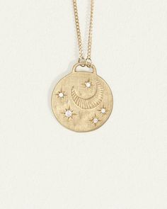 Temple of the Sun Cosmo Necklace, hand-crafted in Byron Bay in ethical gold and responsibly sourced diamonds. Shop fine jewellery and coin necklaces. 14k Gold Round Coin Necklace Fine Jewelry, Recycled Gold Medallion Coin Pendant, Amulet Style Coin Pendant Jewelry In Recycled Gold, Amulet Style Jewelry With Coin Pendant In Recycled Gold, Recycled Gold Coin Pendant Amulet Jewelry, Recycled Gold Amulet Jewelry With Coin Pendant, Yellow Gold Sterling Silver Coin Medallion Necklace, Timeless 14k Gold Coin Pendant Necklace, Amulet Style Yellow Gold Sterling Silver Coin Necklace