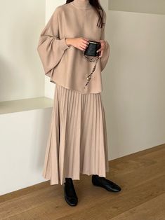 ▶ Colors ◀ Beige Black ▶ Size ◀ One size(Free) ▶ Fabric ◀ Acrylic ▶Size Spec◀ * Sweater * Total Length : 63cm Chest : 60cm(Around 120cm as circular) * Skirt * Total Length : 89cm Chest : 33cm(Elastic banding - Around 66cm as circular) -------------------------------------------- ▶ SHIPPING Information ◀ Delivery usually takes 10~15 business days. (Korea Post EMS) Even it is express shipping, recently it is not easy to get air space flexibly. Please, kindly wait a bit and be patient for us. *Deli Winter Long Pleated Dress, Winter Dress With Long Pleated Skirt, Relaxed Skirted Dress For Fall, Beige Long Skirt For Winter, Beige Long Winter Skirt, Flowy Long Sleeve Dress For Winter, Beige Maxi Skirt For Fall, Chic Long Knit Skirt, Winter Beige Flowy Skirt