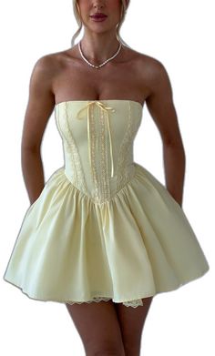 Mini Dress With Boned Fitted Bodice, Mini Dress With Boned Overbust Bodice, Fitted Boned Bodice Mini Dress, Strapless Mini Dress With Lace Bodice For Wedding, Fitted A-line Corset Dress With Lace-up Back, Strapless Ruched Bodice Corset For Prom, Strapless Corset With Ruched Bodice For Prom, Fitted A-line Corset Dress For Debutante Ball, Strapless Corset Dress With Boned Bodice For Prom