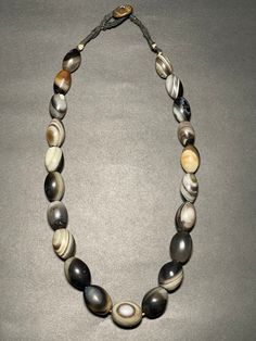 Beautiful/ interesting Antique Himalayan Oval-shaped Agate Beads Necklace from Himalaya(Tibet).Wearable & very unique agates necklace.The Centre piece agate stone has very unique sheep eyes (luk mik) in Tibetan.Beautiful nice patina and great shaped . Tibetan Agate has the meaning and properties of blocking evil energy around you. It is popular as an excellent amulet against evil. It helps maintain a peaceful everyday life. They are considered to be very powerful stones of protection and good luck. Measurements:- Beads size - 15mmx22mm                        20mm-27mm Neckace length - 24.5inches (approximately) Weight- 262 grams  ** Colors may vary slightly  in person due to the lighting/flash lighting in photo shoots. Bohemian Oval Agate Necklace, Elegant Agate Oval Beads, Elegant Oval Agate Beads And Cabochons, Elegant Oval Agate Beads, Polished Oval Agate Beads Jewelry, Oval Agate Polished Beads Jewelry, Oval Agate Gemstone Bead Necklaces, Oval Agate Gemstone Beaded Necklaces, Hand-strung Agate Jewelry With Oval Beads