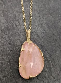 "Fancy cut pink Morganite 18k gold Pendant Gold Necklace gemstone Jewelry byAngeline Morganite feels so soft, gentle and loving. I hand carved this pendant in wax and cast it in solid gold using the lost wax casting process. This one of a kind pendant comes on a solid 18k 18\" chain. The stone measures about 16x25mm. If you don't need a chain for the Pendant please ask about a price reduction to ship w/o chain. Throughout all time and history, in every tribe and culture all around the world crys Morganite Fine Jewelry In Yellow Gold, Luxury Gold Morganite Jewelry, Exquisite Gold Morganite Jewelry, Exquisite Pink Morganite Jewelry, Luxury Pink Briolette Necklace, Oval Morganite Jewelry In Pink Gold, Fine Gold Morganite Jewelry, 14k Yellow Gold Jewelry With Large Stone, Yellow Gold Pendant Jewelry With Large Stone