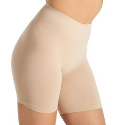 Designed for a seamless fit and full coverage under clothing, this slip short is the perfect solution for a smooth look. Made from nylon and spandex. Wide, double-layer rib-knit waistband keeps the top in place. High rise provides more tummy coverage. Crotch gusset panel guides the fit for no gaps between the legs. Designed for light, all over smoothing. Seamless rear. Long legs have wide, seamless hems to prevent roll up. Protects against inner thigh chafing. Ribbed knit zone at crotch for brea Shapewear With Built-in Bra In Short Shape, Solid Shapewear With Built-in Bra, Short Shape, Solid Color Shapewear With Built-in Bra, Solid Seamless Shapewear In Elastane, Solid Color Seamless Shapewear, Stretch Shapewear With Built-in Bra, Stretch Shapewear With Smoothing Short Length, Solid Compression Shapewear With Seamless Construction, Smoothing Stretch Shapewear In Short Length