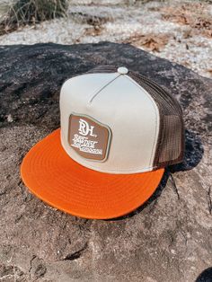 Custom Khaki/Coffee 5 panel style snapback cap featuring the new “Back Country Branded” patch. Outdoor Trucker Style Snapback Hat, Outdoor Trucker Snapback Hat With Patches, Brown Trucker Hat With Letter Patch And Flat Bill, Retro Brown Snapback Hat For Outdoor, Retro Brown 5-panel Trucker Hat, Outdoor Brown Baseball Cap With Letter Patch, Brown Snapback Hat With Letter Patch For Outdoor, Brown Trucker Hat With Embroidered Patch, Outdoor Trucker Hat With Letter Patch And Flat Bill