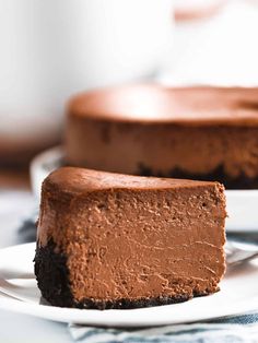 a slice of chocolate cheesecake on a white plate