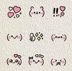 the emoticons are all different shapes and sizes, but one has hearts on them