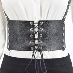 SIZE: Medium MODEL COLOR: Black LEATHER TYPE: Zig Leather MATERIAL: Made from %100 leather. This %100 leather Corset is a must-have for anyone who wants to add a touch of rock and roll to their wardrobe. The wide waistband and lace-up front create a dramatic silhouette, while the studs and grommets add a punk-rock edge. The belt is adjustable, so you can customize the fit to your liking. Pair it with a simple blouse and jeans for a casual look, or dress it up with a cocktail dress for a night ou Simple Blouse, Leather Corset, Black Corset, Wide Waistband, Leather Material, Punk Rock, Night Dress, Pretty Outfits, Rock And Roll