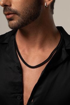 The 7.3mm Men's Black Cuban Chain Necklace is a bold and versatile accessory, crafted from durable stainless steel. This Cuban link necklace is not only stylish but also waterproof, making it perfect for everyday wear. Whether as a gift for your husband or a statement piece for any occasion, this necklace adds a touch of modern sophistication to his look. * Made to order * Materials: Stainless Steel * Color: Black Plating * Chain Width: 7.3mm Approximately * Chain Length: 24" Inches Approximatel Black Chain Link Jewelry For Everyday, Everyday Black Chain Link Jewelry, Elegant Black Curb Chain Necklace, Elegant Black Stainless Steel Chain Necklace, Minimalist Black Chain Link Jewelry, Classic Black Chain Link Necklace, Black Cuban Link Jewelry With Curb Chain, Black Cuban Link Curb Chain Jewelry, Everyday Black Link Chain Necklace