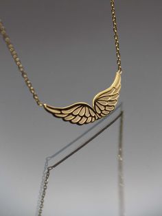 Angel Wings 14k 18k Real Gold Necklace Pendant - Gold in Angel Wings - Memorial Gift - Personalized Angel Wing ▶ 14K Solid Gold (585) ▶ 18K Solid Gold (750) ▶ Options: White,Rose,Yellow ABOUT NECKLACE Handmade with 14k/18k solid real gold. You can order this Angel Wings gold necklace with 3 different color options, 5 different necklace length options and free & express shipping to the all-around the world. What is 14k Gold? 14K gold is a mixture which primarily consists of gold that is blended w Angle Necklace Gold, Wings Necklace Angel, Angel Wings Gold, Wings Jewelry, Angel Wings Pendant, Jewelry Necklace Simple, Angel Wings Necklace, Gold Necklace Pendant, Real Gold Necklace