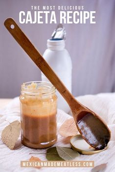 there is a spoon that is next to a jar