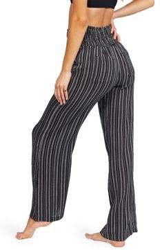 Perfect for casual days spent strolling the boardwalk, this pair of wide-leg pants is fashioned with a stripe pattern and smocked waist. 31 1/2" inseam; 23" leg opening; 13" front rise; 16" back rise (size Medium) Smocked waist Side-seam pockets; back patch pockets 100% cotton Hand wash, line dry Imported Women's Clothing Billabong, Stripes Pattern, Leg Pants, Wide Leg Pants, Women's Clothing, Wide Leg, Hand Wash, Nordstrom, Size Medium