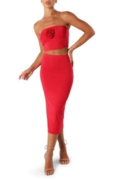 Hit the dance floor in this stunning, stretch-knit set that pairs a cropped tube top with a figure-flaunting midi skirt. Top is strapless Skirt has elastic waist Lined 85% polyester, 15% spandex Hand wash, dry flat Imported Stretch Elastane Tube Top For Party, Fitted Bandeau Elastane Crop Top, Summer Club Crop Top In Elastane, Summer Club Crop Top, Fitted Elastane Crop Top For Party, Spring Party Crop Top In Elastane, Spring Club Crop Top Fitted, Fitted Crop Top For Club And Spring, Spring Club Fitted Crop Top