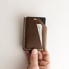 This beautiful every day carry, slim wallet is as simple as it gets. Easily carries 3 or 4 of your daily cards, and will stretch to hold more with regular use. Stash cash, receipts or spare items in the front pocket.------3.75" x 2.75" x .25" Cut out of high quality Horween leather from legendary American tannery Horween Leather and hand stitched using waxed polyester thread. ------✉️ SIGN UP for our newsletter and get a coupon code for 10% off ➡️  http://bit.ly/choicecutsind