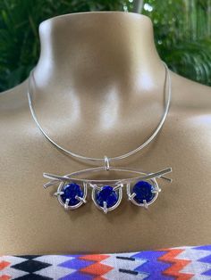 "I handcrafted this sterling silver pendant with 3 lapis lazuli cabochons. It hangs from a sterling silver 16\" omega silver chain with removable end cap. *1 Only* Pendant measures:2.5 inches wide Lapis Lazuli measure: 10mm each Chain measures:16 inches long I make each piece of jewelry, one piece at a time by hand in my studio. Each piece comes wrapped in anti-tarnish paper and placed inside a gray paper box  or metal tin. Perfect for gift giving." Silver Necklace With Round Lapis Lazuli Pendant, Silver Lapis Lazuli Round Pendant Necklace, Silver Lapis Lazuli Round Pendant Jewelry, Silver Lapis Lazuli Necklaces, Nickel-free Silver Lapis Lazuli Necklace, Lapis Necklace, Cabochons Stones, Unique Necklace, Necklace Boho