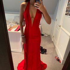 Red Plunge Gown Red V-neck Evening Dress For Prom, V-neck Gown For Red Carpet And Prom Season, Backless Dresses For Red Carpet And Prom Season, Backless Dresses For Prom Season And Red Carpet, Red Gown For Prom Season Night Out, Red Gown For Prom Night Out, Red Backless Evening Dress, Red Floor-length Evening Dress For Night Out, Red V-neck Party Gown