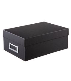 a black storage box with silver handles on an isolated white background