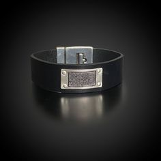 "This bracelet is genuine cowhide leather, with a sleek flat black finish measuring approximately 3/4\". The buckle clasp, designed in a \"T\" style, includes a powerful magnet and a secure notched fitting for a reliable closure. The bracelet features a personalized sterling silver plate, perfect for adding fingerprints, handwriting, signatures, custom text, or significant dates. This plate is securely attached to the leather with rivets. Sterling silver plate sizes: SMALL SILVER PLATE Approxima Leather Wristband For Everyday Use, Black Engraved Leather Bracelet For Everyday, Everyday Black Engraved Leather Bracelet, Everyday Black Leather Bracelet Engraved, Black Leather Bracelet For Everyday Use, Classic Black Leather Bracelet Engraved, Silver Leather Bracelets For Business, Classic Black Engraved Leather Bracelet, Modern Black Rectangular Leather Bracelet