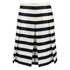 MARC JACOBS skirt in a black and white polyester fabric featuring a stripe pattern, flared style, silk lining, and back zipper closure. Made in USA.Very Good Pre-Owned Condition. Minor signs of wear. Marked: 10 Measurements: Waist: 34 inches Hip: 46 inches Length: 23 inches Sui Generis Reference: 130691 Category: Skirt More Details Brand: MARC JACOBS Gender: Female Size: 10 Color: Black Color 2: White Fabric: Polyester Pattern: Stripe Style: Flared Age Group: Adult Marc Jacobs Skirt, Black And White Striped Skirt, Prada Skirt, White Striped Skirt, Parsons School Of Design, Knee Skirts, Black And White Skirt, Striped Skirt, Jacob Black