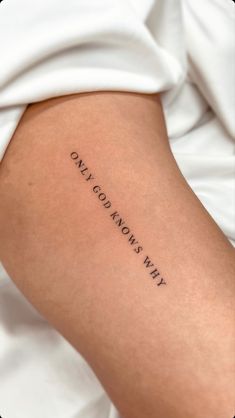 a person with a tattoo on their arm that says, my world is ours