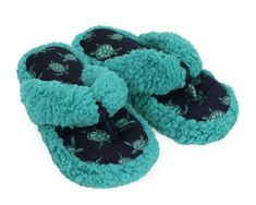 These super comfy slippers feature Sea Turtles swimming in the deep blue sea! The flip flop/spa style is perfect for warmer weather—when you want to be comfy but not too hot.

Made with velvety soft microfiber lining, fabulously fuzzy teal uppers, and high density foam footbeds with non-slip grips on the soles. Turtle Slippers, Turtles Swimming, Turtle Swimming, The Deep Blue Sea, Comfy Slippers