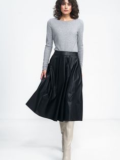 You haven't seen such a skirt with us yet! The midi skirt is made of imitation leather material and has a waist belt, so it will perfectly emphasize your figure. Fastened at the back with a zipper. The pleats on the belt line and the midi length will emphasize your waist and elongate your figure. It will perfectly match autumn styling with boots, high boots and thick sweaters. Polyurethane 45 % Viscose 55 % Size Lenght Hips width Waist width 36 74 cm 96 cm 72 cm 38 74 cm 100 cm 76 cm 40 75 cm 10 Plus Size Pullover, Skirt Model, Buy Skirts, Thick Sweaters, Boots High, La Fashion, Sleek Fashion, Knee Length Skirt, Waist Belt