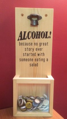 a wooden sign that says alcohol because no great story ever started with someone eating a salad