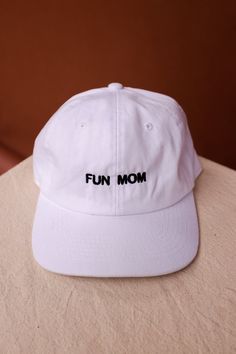 "Im not like a regular mom , I'm a fun mom." Intentionally Blank "Fun Mom" dad hat saying it all for you. cool mom One size. Adjustable back. Hand embroidered in LA. PIPE AND ROW Fun Adjustable Baseball Cap For Everyday Wear, Funny Adjustable Dad Hat Baseball Cap, White Dad Hat With Letter Print, White Baseball Cap Dad Hat With Letter Print, White Dad Hat Baseball Cap With Letter Print, Adjustable Fun Dad Hat For Streetwear, Funny Baseball Cap With Curved Bill, Fun Adjustable Dad Hat For Streetwear, Adjustable Curved Brim Fun Dad Hat