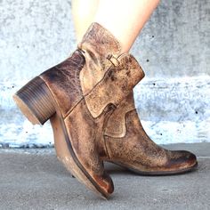 Supple tan leather cow girl bootie with all over brown crackle patina. Rubber sole, high and loose ankle opening. heel: 2" Cow Girl, Leather Boot, Tan Leather, Bootie, Cowboy Boots, Leather Boots, Bootie Boots, Rubber Sole, Patina