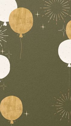 gold and white balloons floating in the air with sparklers on them, against a dark green background