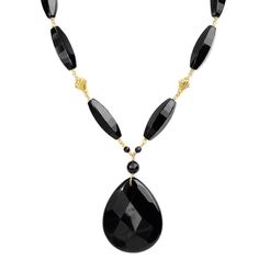 Hand Created Black Onyx Necklace with Gold AccentsNeckline is Composed of Beautifully Faceted Onyx Stones. Get some matching earrings BSER090716-01 or BSER101716-01 Stones: Onyx Length: Approx. 17"-19" Width: Large Drop is approx. 1 3/4" long and 1 1/2" wide Material: The fans are gold plated silver & the toggle is gold filled Made in: USA Luxury Black Necklace With Natural Stones, Luxury Onyx Jewelry With Faceted Beads, Luxury Statement Onyx Necklace, Elegant Polished Bead Jewelry For Evening, Elegant Polished Beads Jewelry For Evening, Elegant Evening Jewelry With Polished Beads, Formal Briolette Jewelry With Polished Beads, Black Stone Jewelry For Party, Elegant Black Necklace With Stones