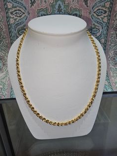 Circa 1990, a 20" long x 3.5mm wide 10k yellow gold rope chain with lobster claw clasp. Weight is 23.1 grams. Condition is very good. Stamped 417. Thanks for looking. ERA - Circa 1990, Modern Vintage METAL / MATERIAL - 10k yellow gold  MARKINGS / HISTORY - Stamped 417 CONDITION - The overall condition is very good! A true representation of 1990s-era jewelry! SIZE / MEASUREMENTS - 20" long x 3.5mm wide 10k yellow gold rope chain. Weight is 23.1 grams. VINTAGE/ANTIQUE/HANDMADE - This item is VINTAGE. Add this timeless piece to your estate collection, to your wardrobe to jazz up any outfit, or gift it to an admirer of all things vintage and heirloom. Thanks for looking! DISCLAIMER - *Please note that the majority of vintage and antique items will reflect slight imperfections due to time, age, Formal Oval Link Rope Chain Jewelry, Classic Rope Chain Necklace In 14k Gold, 14k Gold Link Rope Chain Necklace, Formal Gold Rope Chain Link Necklace, Yellow Gold Rope Chain Necklace, Formal Yellow Gold Tarnish-resistant Rope Chain Necklace, 14k Gold Oval Link Rope Chain Necklace, Formal Gold Tarnish-resistant Rope Chain Necklace, 14k Gold Rope Chain Necklace For Formal Occasions