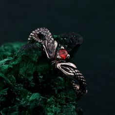 🌟 Warm Greetings, Jewelry Enthusiasts! 🌟 Step into a world where elegance meets personalization with our handcrafted silver rings. Each piece is a testament to unique artistry, blending mystical charm with modern finesse. Our collection offers a special touch for those who adore distinctive and thoughtfully designed jewelry. 🌈 Customization at Your Fingertips: Choose your perfect ring size and select from a variety of enchanting gemstones using our user-friendly dropdown menus. We delight in offering you the chance to create a ring that resonates with your personal style and story. ✨ Design It Your Way: Dreaming of a specific look? We're here to make it happen! Whether it's altering dimensions, adding extra gemstones, or choosing a different material, reach out to us. Your imagination i Red Snake Ring, Snake Engagement Ring, Wedding Ring Infinity, Serpent Ring, Fantasy Wedding, Crafts Beautiful, Shiny Silver, Perfect Ring, Elegant Gift