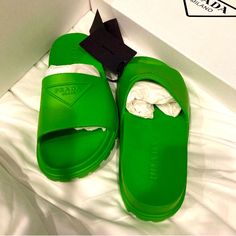 Authentic Prada Sandals Green Flat Slides With Removable Insole, Green Open Toe Slides With Removable Insole, Designer Green Open Toe Sandals, Luxury Green Sandals With Round Toe, Luxury Green Round Toe Sandals, Designer Green Sandals With Round Toe, Green Slides With Round Toe, Designer Round Toe Summer Slides, Designer Round Toe Slides For Summer