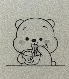 a drawing of a teddy bear eating food