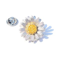 Look presentable and stylish with a Flower Brooch! This decorative accessory, often worn on the lapel of a dress or blouse, is sure to add some sparkle and life to any ensemble. The Flower Brooch has long been a symbol of elegance and sophistication. It comes in many shapes and sizes, from simple designs featuring enamelled flowers to intricate designs featuring gemstones, gold filigree, and delicate seed pearls. In some cultures, Flower brooches are used as symbols of luck or protection. Some F Silver Flower Lapel Pin, Silver Flower Shaped Lapel Pin Brooch, Silver Flower Brooch Pins, Spring Brooch Pins As Gifts, Silver Flower Brooch With Floral Decoration, Silver Flower Brooch With Flower Decoration, Silver Flower Shaped Brooch With Floral Decoration, Silver Flower Brooches With Flower Decoration, Formal Flower Lapel Pin