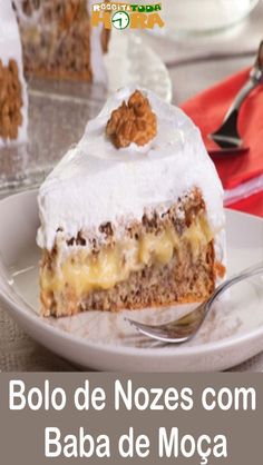 a piece of cake sitting on top of a white plate with a fork in it