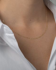 14k solid gold baby figaro cable link chain necklace available in your choice of length and gold color. Chain: Approx. 1mm(W) Weight: 16" is approx. 1 gram Comes gift ready Dainty Link Chain Necklace With Curb Chain, Dainty Curb Chain Link Necklace, 14k Gold Filled Figaro Link Chain Necklace, Dainty Figaro Chain Necklace As Gift, Dainty 14k Gold Figaro Chain Necklace, Delicate 14k Gold Necklace With Figaro Chain, Minimalist Yellow Gold Figaro Chain Necklace, Delicate Everyday Figaro Chain Necklace, Dainty Figaro Chain Necklace