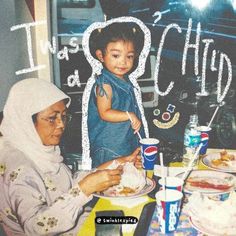 an older woman sitting at a table with a young child in front of her eating food