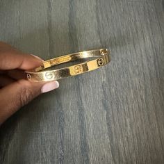 I Purchased Years Ago From Another Posher. This Is The Cartier Charles Revson Item. This Item Is Missing A Screw. I Purchase This Way. I Would Say This Is Large Size. Classic Cartier Bracelets For Wedding, Luxury 14k Stamped Bangle Gift, Cartier Gold Jubilee Bracelet For Wedding, Luxury Cartier Bracelets For Wedding, Cartier Gold Bangle Bracelet For Wedding, Cartier Gold Bracelet For Anniversary, Cartier Jubilee Bracelet For Wedding, Cartier Gold Bangle For Formal Occasions, Cartier Wedding Jewelry Stamped 14k