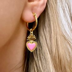 Are you looking for the perfect Valentine's day heart hoop earrings for someone special this Valentine's season? Or a unique pair of sacred heart earrings to spoil yourself? Made with tarnish-free and gold-plated stainless steel hoops and bright enamel, my vintage-style sacred heart earrings are the perfect compliment to any outfit idea! My heart dangle hoop earrings are a great gift idea for any special occasion to all the women in your life. You can't go wrong when gifting my Valentine's day e Pink Heart Charm Hoop Earrings For Valentine's Day, Pink Hoop Earrings With Heart Charm For Valentine's Day, Pink Huggie Heart Earrings, Trendy Heart Charm Hoop Earrings, Pink Dangle Hoop Earrings For Valentine's Day, Valentine's Day Heart Charm Dangle Hoop Earrings, Valentine's Day Dangle Hoop Earrings With Heart Charm, Valentine's Day Small Hoop Single Earring, Pink Dangle Heart Earring