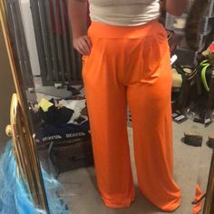 Never Worn, Very Cute Bright Neon Orange Wide Leg Pants High Waist Orange Bottoms, High Waist Pants With Side Pockets For Day Out, Casual High Waist Orange Pants, Orange Wide Leg Bottoms With Pockets, Orange Solid Bottoms For Spring, Orange Solid Color Bottoms For Spring, Orange Wide-leg Pants With Pockets, Casual Orange High Waist Wide Leg Pants, High Waist Harem Pants With Pockets For Day Out