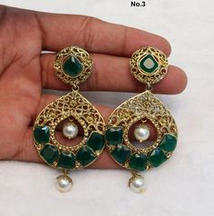 *gold finish light weight earrings set. Green Drop Earrings Danglers For Festivals, Festive Green Drop Earrings Danglers, Green Drop Earrings For Festivals, Green Round Danglers For Party, Green Bollywood Jhumkas Drop Earrings, Green Drop Earrings Jhumkas For Diwali, Green Kundan Earrings With Stone Work, Green Drop Jhumkas For Diwali, Green Earrings For Diwali Festive