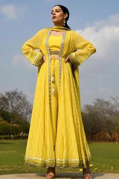 Shop for Surbhi Gupta Yellow Georgette Embroidered Cape And Pant Set for Women Online at Aza Fashions Indian Kurti Designs, Haldi Outfit, Indian Fashion Trends, Cute Casual Dresses, Indo Western Dress, Long Frocks, Wide Trousers, Yellow Jacket, Designer Dresses Indian