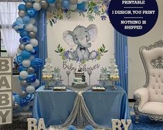 an elephant themed baby shower with blue and silver decorations