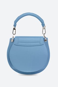 The Lucky Bag, Leather Saddle Bag in Sky Blue – Gaucho - Buenos Aires Beautiful Bags & Purses, Luxury Blue Bag With Round Handle, Luxury Saddle Bag Satchel For On-the-go, Luxury Blue Bags With Round Handle, Luxury Saddle Bag With Top Carry Handle, Blue Leather Shoulder Bag With Palladium Hardware, Luxury Blue Satchel With Palladium Hardware, Designer Blue Shoulder Bag With Palladium Hardware, Blue Satchel Shoulder Bag With Palladium Hardware