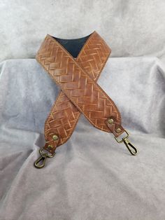 "Please visit our Etsy shop at:  https://alforddesignsltd.etsy.com and check out our large assortment of leather replacement straps - lots of colors, and textures for bags, purses,  briefcases, and more! Brandy/ honey-colored Embossed braided genuine cowhide leather(Please note that this is a 2\" wide strap in the photo). Introducing our exquisite Custom Made Genuine Embossed Cowhide Leather Cut-Resistant Replacement Straps, that include sophistication, strength, and style. Crafted with utmost p Custom Strap, Leather Cuts, Visual Texture, Purse Strap, Bags Purses, Wide Straps, Crossbody Purse, Bag Straps, Embossed Leather