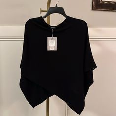 Nwt Black Adelyn Poncho One Size Jersey Knit Feel Would Make A Perfect Nursing Cape Questions? Leave A Comment Below! Chic One-size Poncho For Layering, Black Batwing Sleeve Sweater For Layering, Chic Poncho For Layering, Oversized Black Knit Poncho, Black Oversized Chic Poncho, Oversized Black Chic Poncho, Black Knit One-size Poncho, Chic Black Poncho For Layering, Chic One Size Poncho With Batwing Sleeve