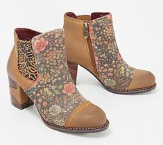 Everyone is an artist in these colorful boots! Carefully crafted in rich leather, floral designs, and rainbow stitching details, the Melvina is a must for the modern woman who wants to infuse feminine flair into her footwear collection.  (And just think of all the creative street cred you get every time you step out in them.) From Spring Step. Multicolor Bohemian Boots For Spring, Bohemian Multicolor Boots For Spring, Brown Floral Print Boots For Fall, Multicolor Ankle-high Boots For Fall, Fall Floral Print Boots With Round Toe, Spring Leather Boots With Floral Print, Leather Boots With Floral Print For Spring, Spring Bohemian Ankle-high Boots, Multicolor Leather Boots For Spring