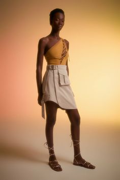 Light beige, asymmetrical cargo skirt with two functional pockets. Hidden snap closure at the front. Model is wearing sample size 34.Materials: 97% COTTON, 3% EAModel Measurements:Height: 180 cmChest: 83 cmWaist: 65 cmHip: 89 cmWears 34Runs true to size take your usual size.Care Instructions: Dry Clean Only Caro Skirt, Beige Skirt, Cargo Skirt, Light Beige, Snap Closure, Care Instructions, Dry Clean, Skirt, How To Wear